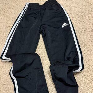 Boy's black Adidas pants, size S